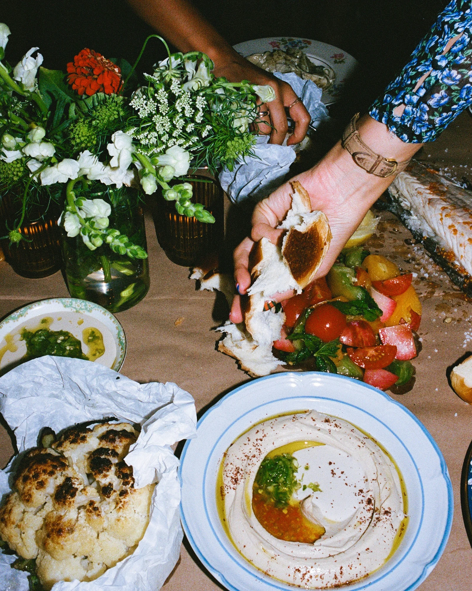 Dinner party with friends sharing food